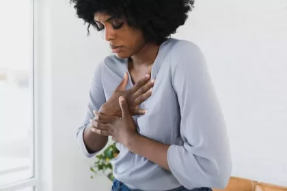 A woman having a chest pain due to a heart attack