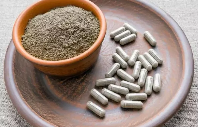 Triphala capsules are kept in a plate