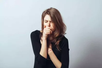 a girl doing a coughing due to a lung infection