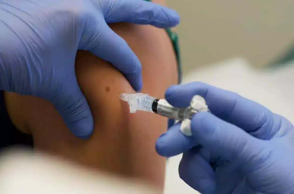 swin flu injection being administered on the arm