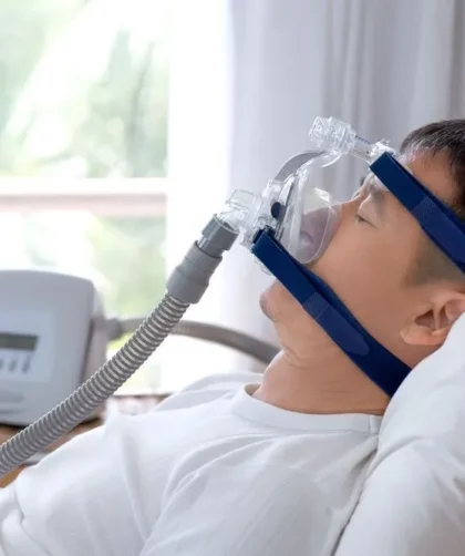 A person wearing ventilator face mask