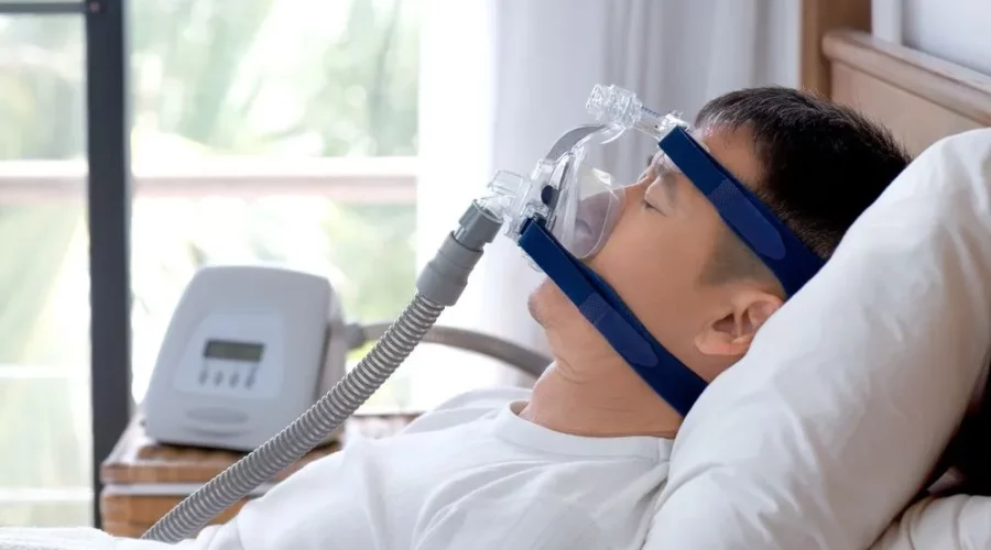 A person wearing ventilator face mask