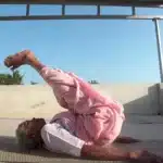 a old Indian woman doing yoga during menopause