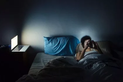 A girl using mobile a bed time